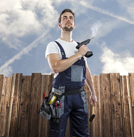 worker ready to start working with a smoking drill bit