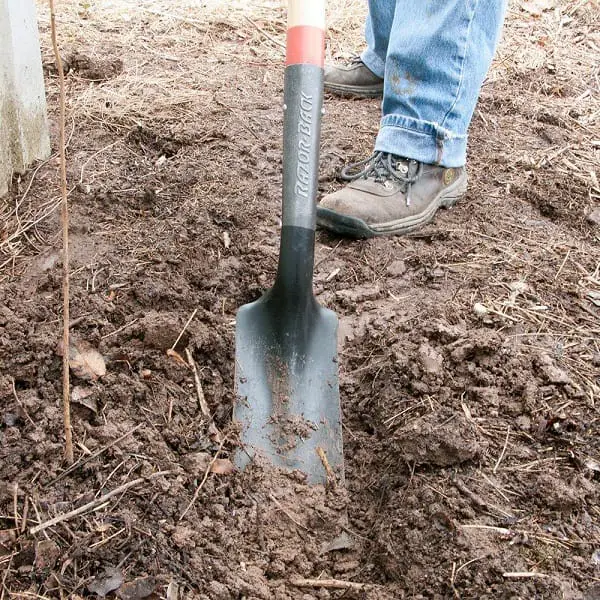 The collar of a Razorback Trench Shovel in action