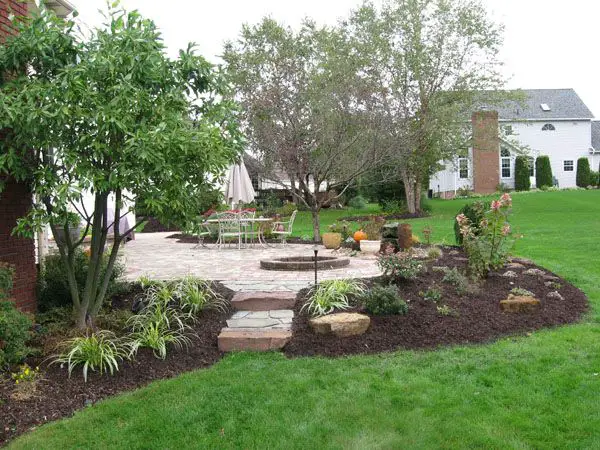 15 Landscaping Ideas Around Patio and Paved Areas