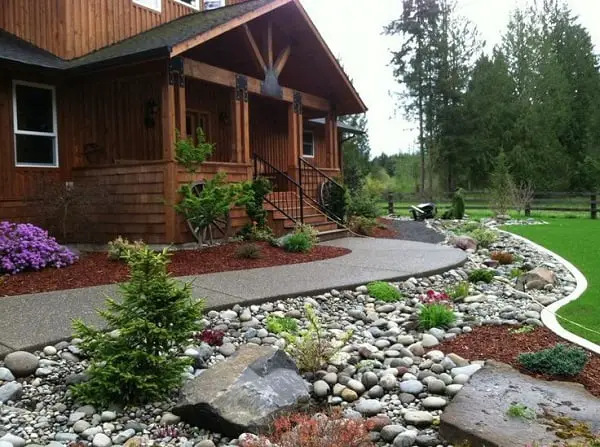 Featured image of post Front Yard Landscaping Ideas With White Rocks - The small pink and white rock area in front could be a driveway or nothing more than a barrier between the yard and street.
